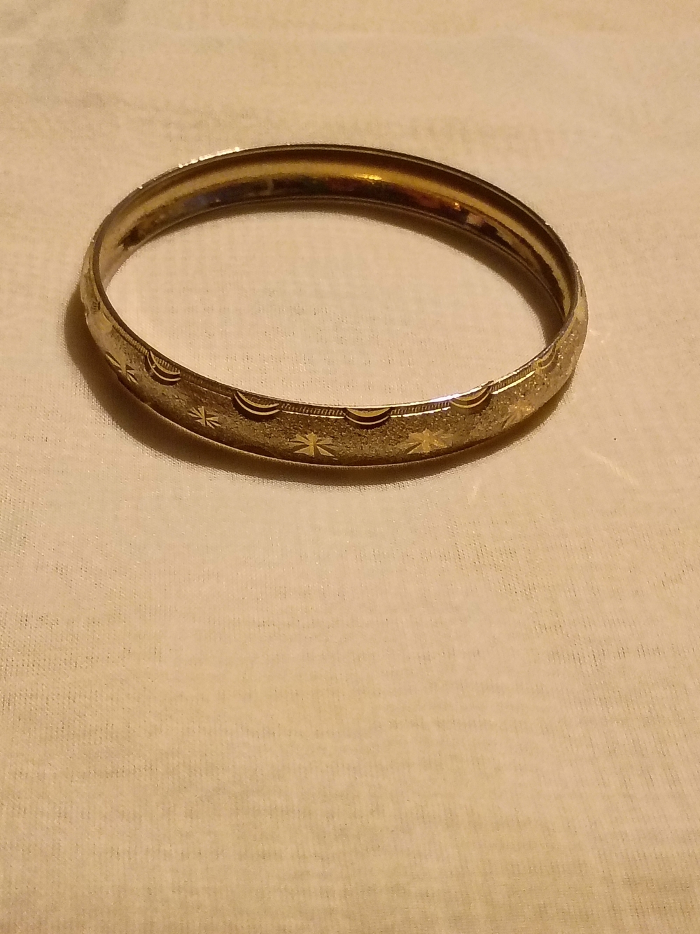 Gold-Tone Star Engraved Bangle Bracelet